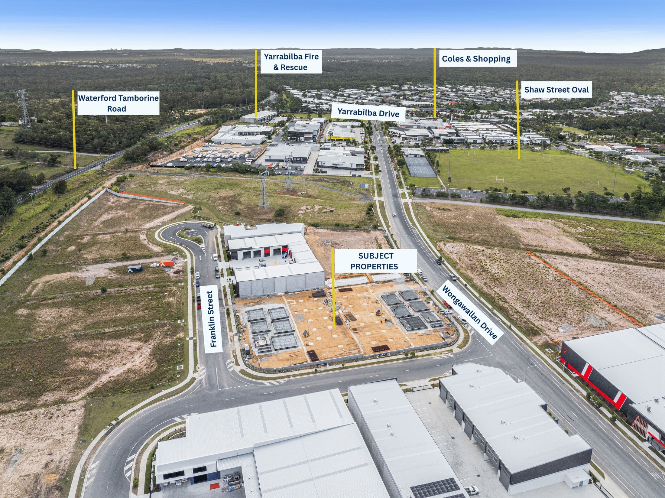 Labelled aerial view of the PENTA Industrial site between Franklin Street and Wongawallan Drive, with nearby roads, shops, emergency services and Shaw Street Oval identified